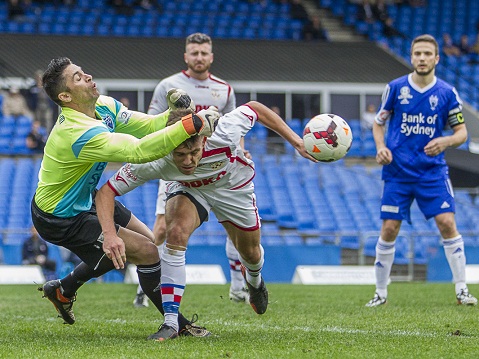 Action during Round 12 of 2014 IGA National Premier Leagues NSW Men's 1 between Sydney Olympic v Sydney United 58 at Belmore Sports Ground, Sydney, NSW on June 01, 2014. (Photo by Gavin Leung)