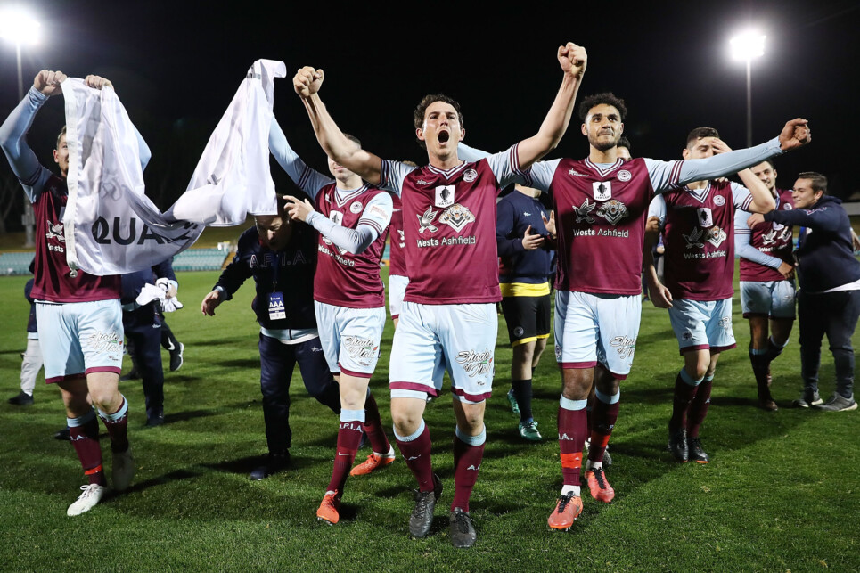 SYDNEY, AUSTRALIA - AUGUST 21:  APIA Leichhardt Tigers players celebrate victory in the FFA Cup round of 16 match between APIA Leichhardt Tigers FC and Melbourne Victory at Leichhardt Oval on August 21, 2018 in Sydney, Australia.  (Photo by Mark Metcalfe/Getty Images)