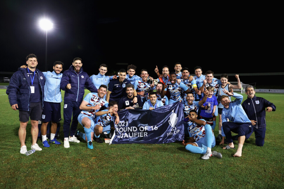 CANBERRA, AUSTRALIA - DECEMBER 02: Leichhardt FC players celebrate winning the FFA Cup round of 32 match between Tigers FC and APIA Leichhardt FC at Seiffert Oval on December 02, 2021 in Canberra, Australia. (Photo by Cameron Spencer/Getty Images)