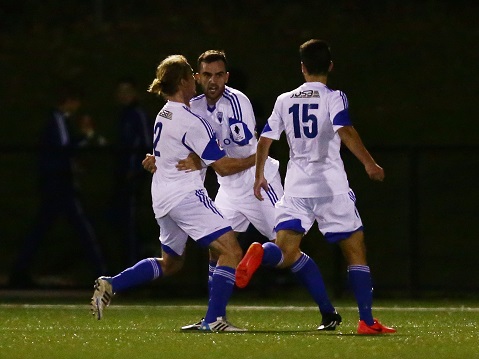 SYDNEY, AUSTRALIA - JULY 29:  Michael Gaitatzis of Olympic (C) celebrates with team mates after kicking their first goal during the FFA Cup match between Manly United and Sydney Olympic at Cromer Park on July 29, 2014 in Sydney, Australia.  (Photo by Matt King/Getty Images)