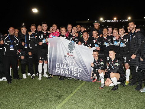 SYDNEY, AUSTRALIA - AUGUST 29:  Blacktown City pose with the Westfield FFA Cup quarter final qualification flag during the round of 16 FFA Cup match between Blacktown City and APIA Leichhardt Tigers at Lily Homes Stadium on August 29, 2017 in Sydney, Australia.  (Photo by Mark Metcalfe/Getty Images)