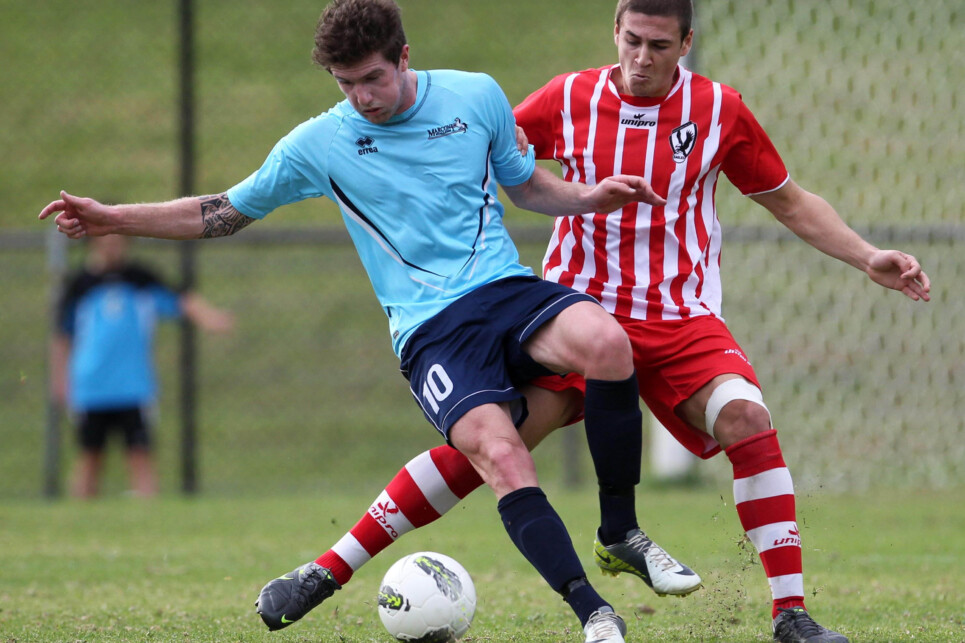 April 15: Joey Gibbs of Marconi Stallions battles Parramatta's Nicholas Napoli during round three of the FNSW Premier League match between Parramatta FC and Marconi Stallions at Melita Stadium (Photo: Damian Briggs)