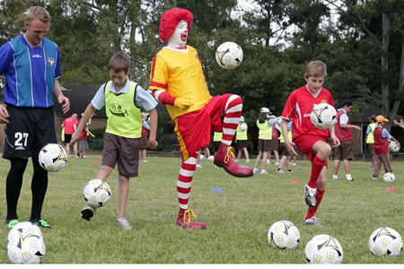 a group of young men playing a game of football