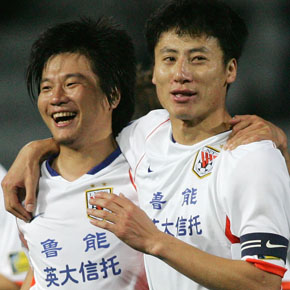 ADELAIDE, AUSTRALIA - MARCH 07:  Jinyu Li and Chang Shu of Shandong celebrates after winning the AFC Champions League Group G match between Adelaide United and Shandong Luneng at Hindmarsh Stadium March 7, 2007 in Adelaide, Australia.  (Photo by James Knowler/Getty Images) *** Local Caption *** Jinyu Li;Chang Shu
