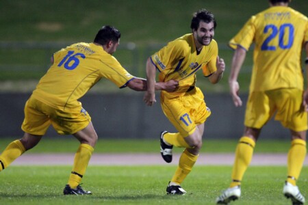 a group of football players on a field