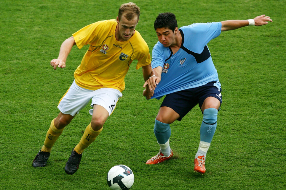 National Youth League Rd 15 - Sydney FC v Mariners SYDNEY, AUSTRALIA - DECEMBER 23: Dimitrios Petratos of Sydney and Nathan Sherlock of the Mariners compete for the ball during the round 15 National Youth League match between Sydney FC and the Central Coast Mariners at the Sydney Football Stadium on December 23, 2009 in Sydney, Australia. (Photo by Matt King/Getty Images)