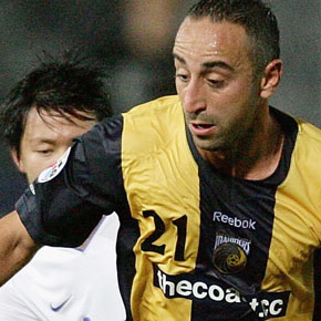 GOSFORD, AUSTRALIA - MAY 19: Ahmad Elrich of the Mariners is challenged during the AFC Champions League Group H match between the Central Coast Mariners and the Tianjin Teda at Bluetongue Stadium on May 19, 2009 in Gosford, Australia.  (Photo by Mark Nolan/Getty Images) *** Local Caption *** Ahmad Elrich