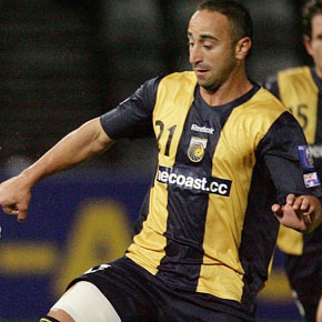 GOSFORD, AUSTRALIA - MAY 19: Ma Leilei of Tianjin Teda and Ahmad Elrich of the Mariners contest possession during the AFC Champions League Group H match between the Central Coast Mariners and the Tianjin Teda at Bluetongue Stadium on May 19, 2009 in Gosford, Australia.  (Photo by Mark Nolan/Getty Images) *** Local Caption *** Ma Leilei;Ahmad Elrich