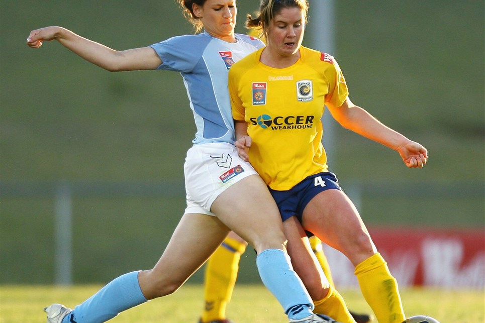 SYDNEY, AUSTRALIA - NOVEMBER 22:  Rachael Doyle (R) of the Mariners is tackled by Jessica Seaman of Sydney during the round five W-League match between Sydney FC and the Central Coast Mariners at Campbelltown Stadium on November 22, 2008 in Sydney, Australia.  (Photo by Mark Nolan/Getty Images)