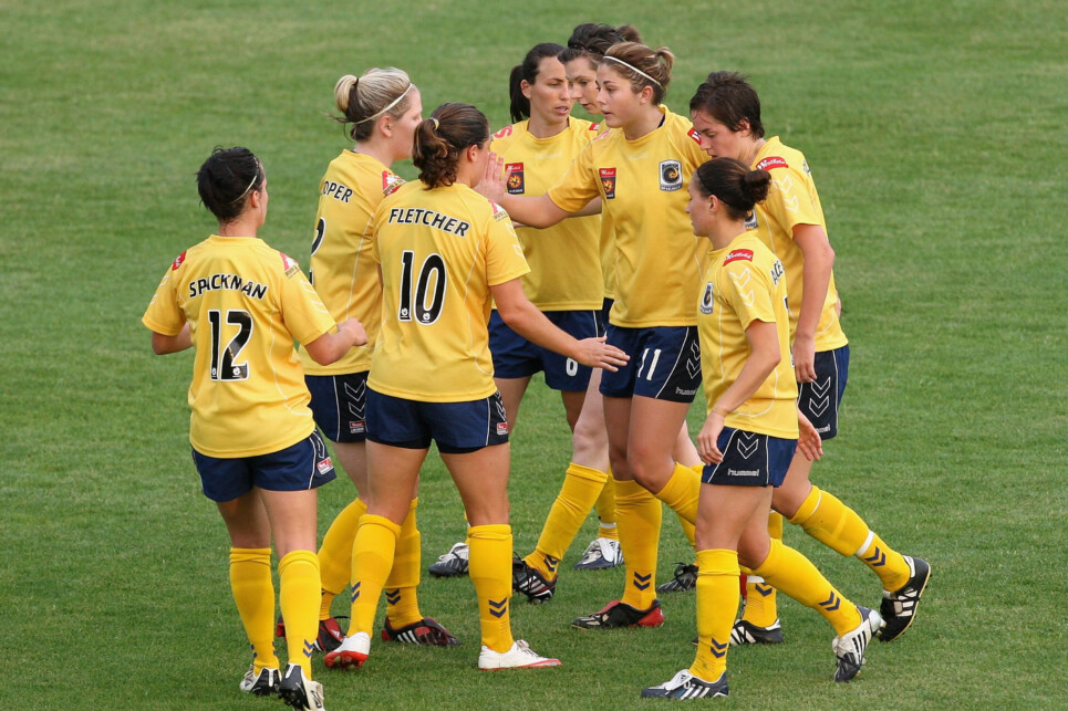 SYDNEY, AUSTRALIA - NOVEMBER 21:  Michelle Heyman of the Mariners is congratulated by her team mates after scoring a goal during the round eight W-League match between the Central Coast Mariners and the Melbourne Victory at Leichhardt Oval on November 21, 2009 in Sydney, Australia.  (Photo by Mark Kolbe/Getty Images)