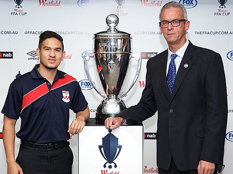 SYDNEY, AUSTRALIA - MAY 12: Kaz Patafta and FFA CEO, David Gallop pose with the Westfield FFA Cup during an FFA Cup Announcement at the FFA Offices on May 12, 2014 in Sydney, Australia.  (Photo by Brendon Thorne/Getty Images)