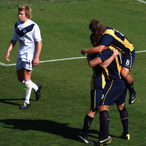 GOSFORD, AUSTRALIA - DECEMBER 12: Nicholas Fitzgarald (R) congratulates Brady Smith (C) of the Mariners after scoring his team's first goal during the round 14 National Youth League match between the Central Coast Mariners and the Melbourne Victory at Bluetongue Stadium on December 12, 2009 in Gosford, Australia.  (Photo by Ryan Pierse/Getty Images) *** Local Caption *** Brady Smith;Nicholas Fitzgarald