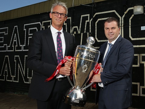SYDNEY, AUSTRALIA - FEBRUARY 19:  FFA CEO David Gallop and Socceroos coach Ange Postecoglou pose with the FFA Cup trophy during the official launch of the 2015 FFA Cup at Earlwood Wanderers FC Club House on February 19, 2015 in Sydney, Australia.  (Photo by Mark Metcalfe/Getty Images)