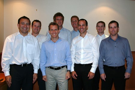 a group of people posing for a photo