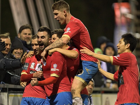 SYDNEY, AUSTRALIA - AUGUST 03:  Asmir Kadric of the White Eagles celebrates scoring a goal with team mates during the FFA Cup round of 32 match between the Bonnyrigg White Eagles and Manly United at Bonnyrigg Sports Ground on August 3, 2016 in Sydney, Australia.  (Photo by Brett Hemmings/Getty Images)