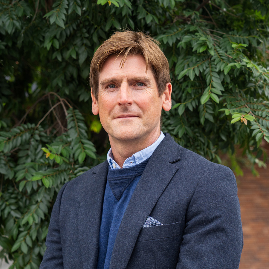 a man wearing a suit and tie