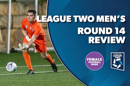 a man holding a football ball