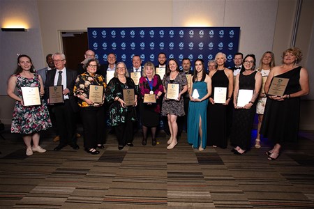 a group of people posing for the camera