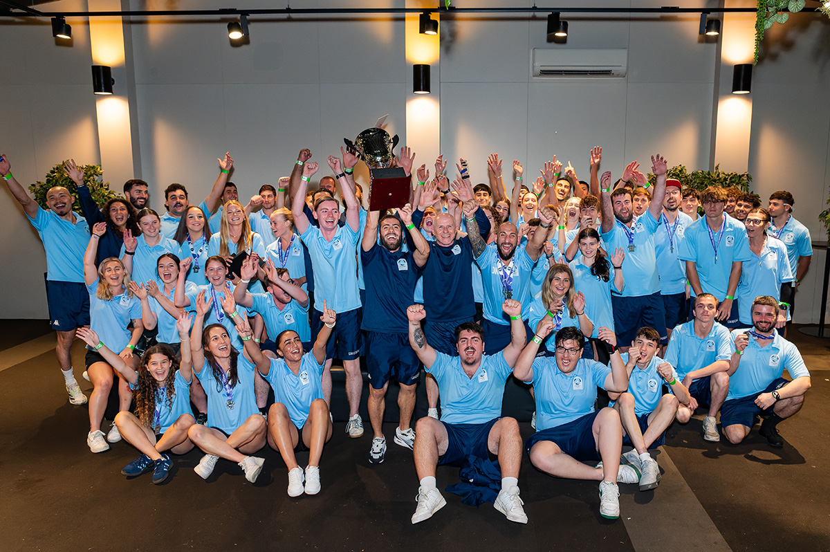 a group of people posing for a photo