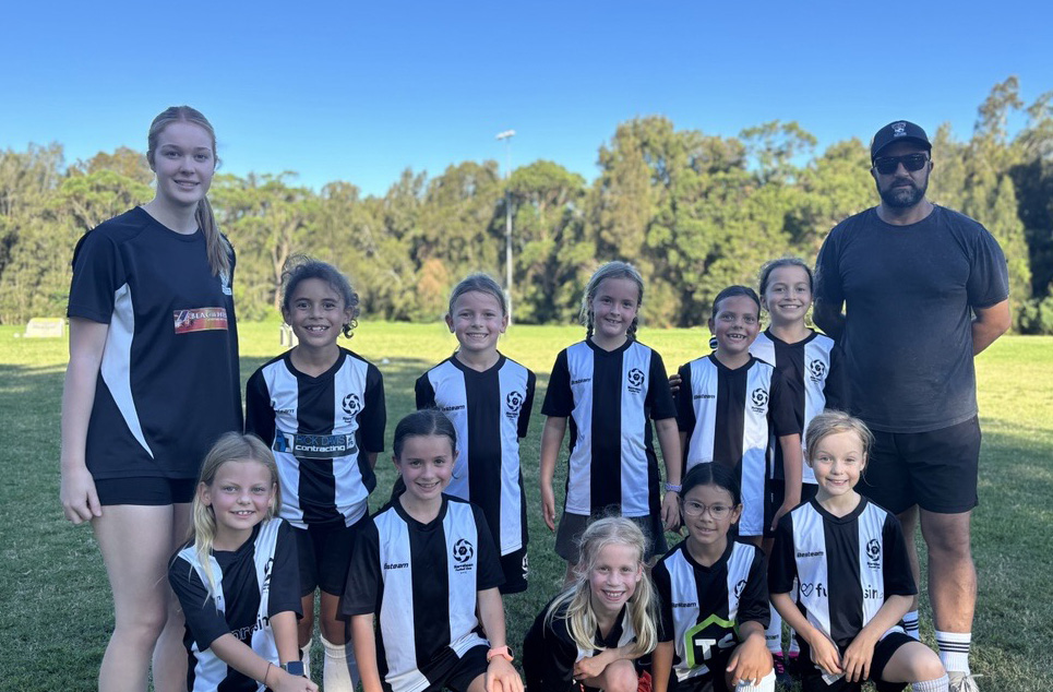 narrabeen fc a group of people posing for a photo