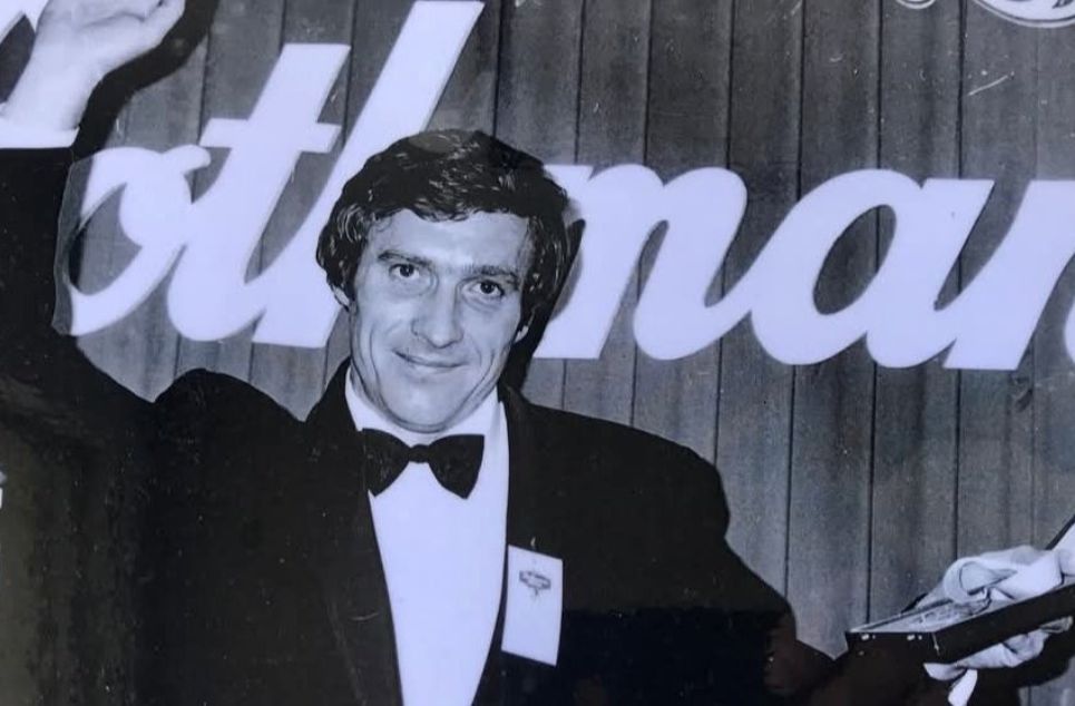 a man wearing a suit and tie