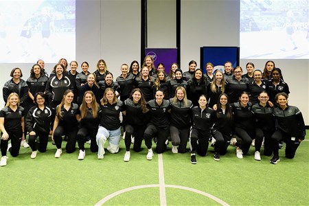 a group of people posing for a photo