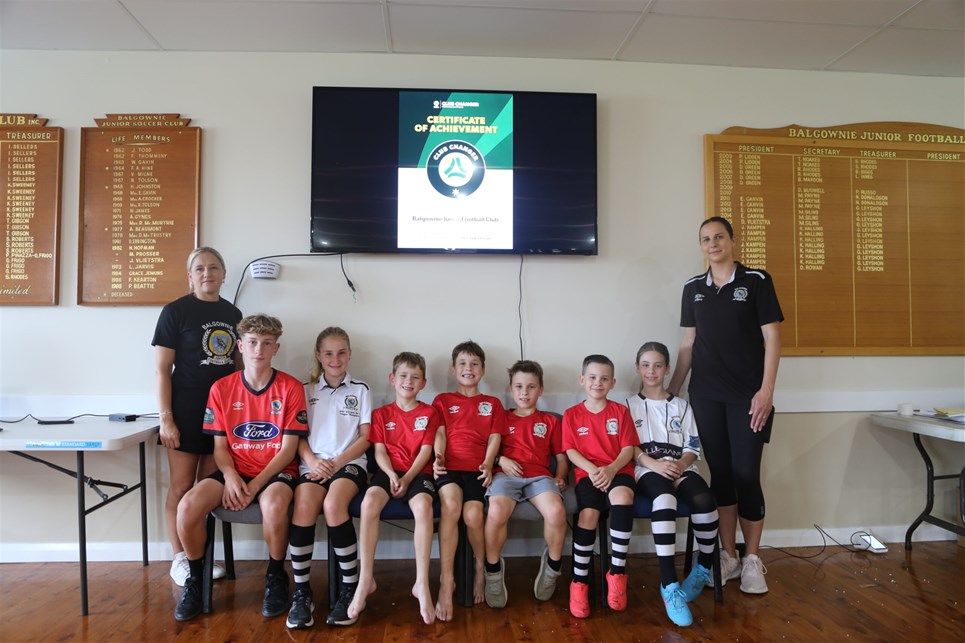 a group of people posing for a picture