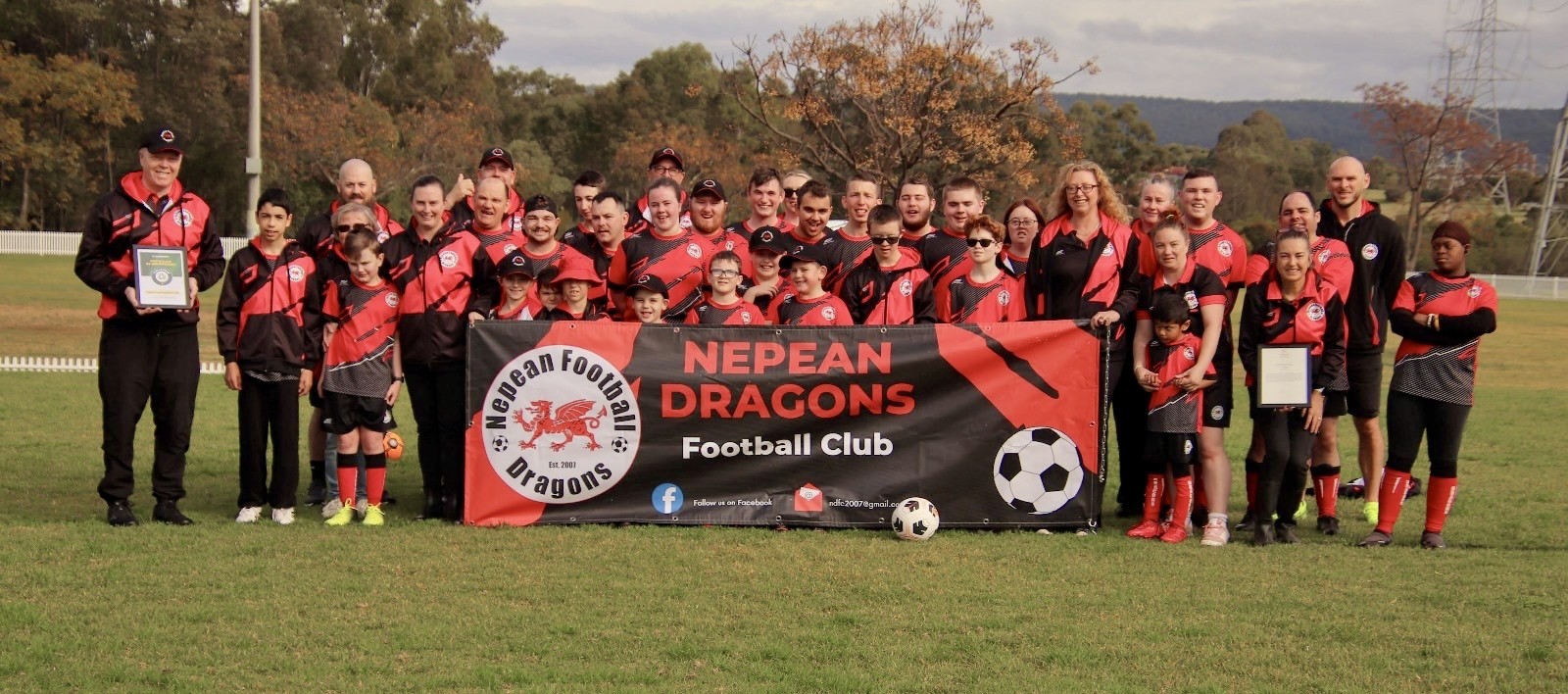 a group of people posing for the camera