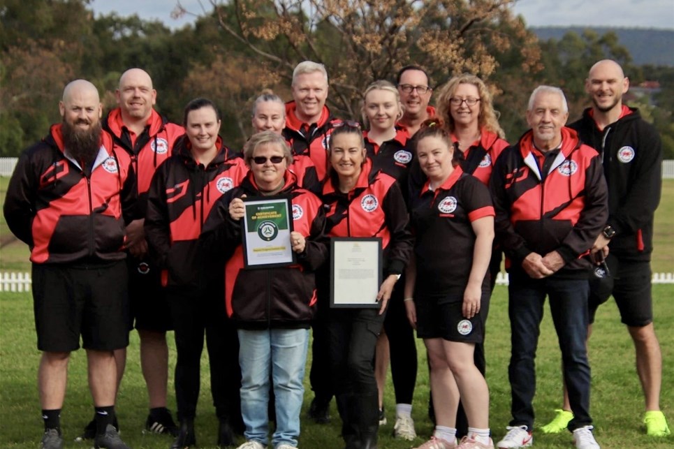 a group of people posing for a photo