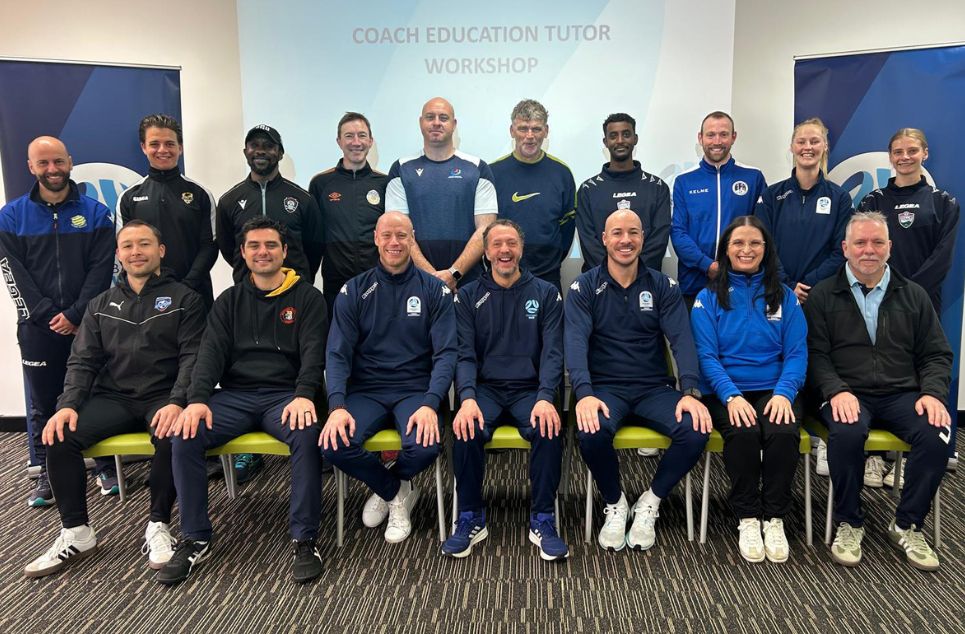 a group of people posing for a photo