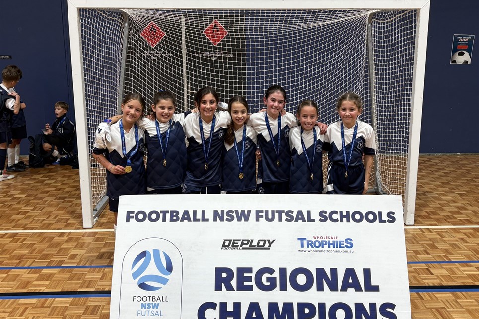 a group of people standing in front of a sign