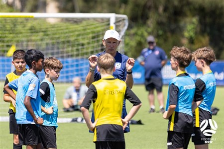 a group of young men playing a game of football