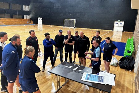 a group of people posing for the camera