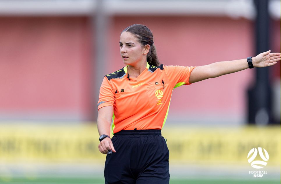 a person holding a football ball