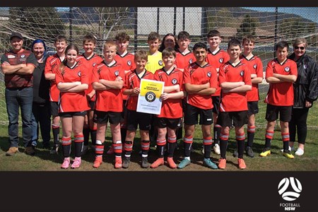 a group of people posing for a photo