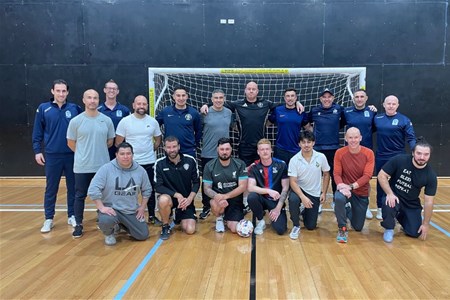 a group of people posing for the camera