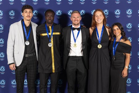 a group of people posing for a photo