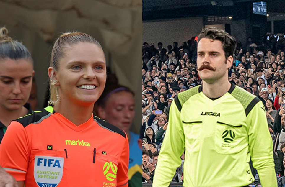 a group of people standing in front of a crowd posing for the camera