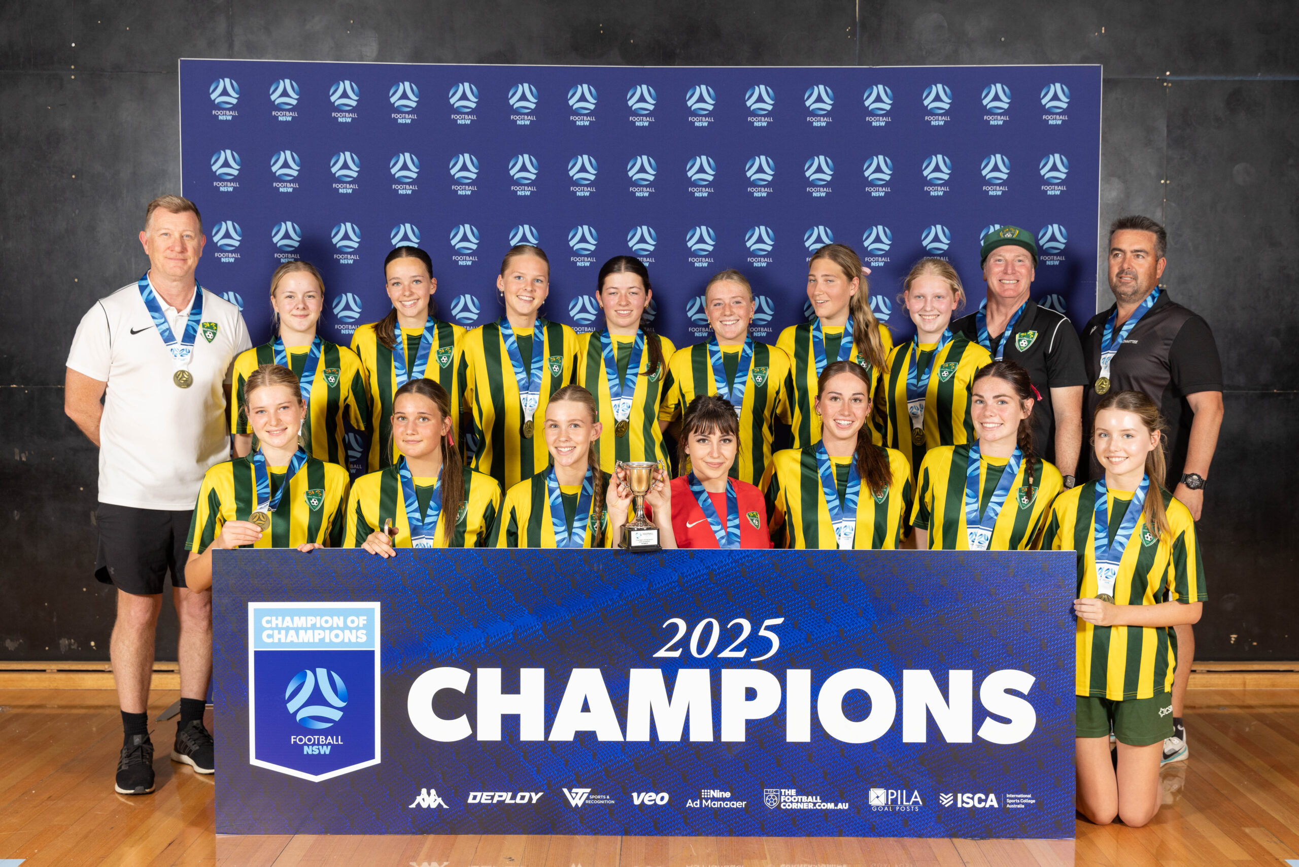 a group of people posing for the camera