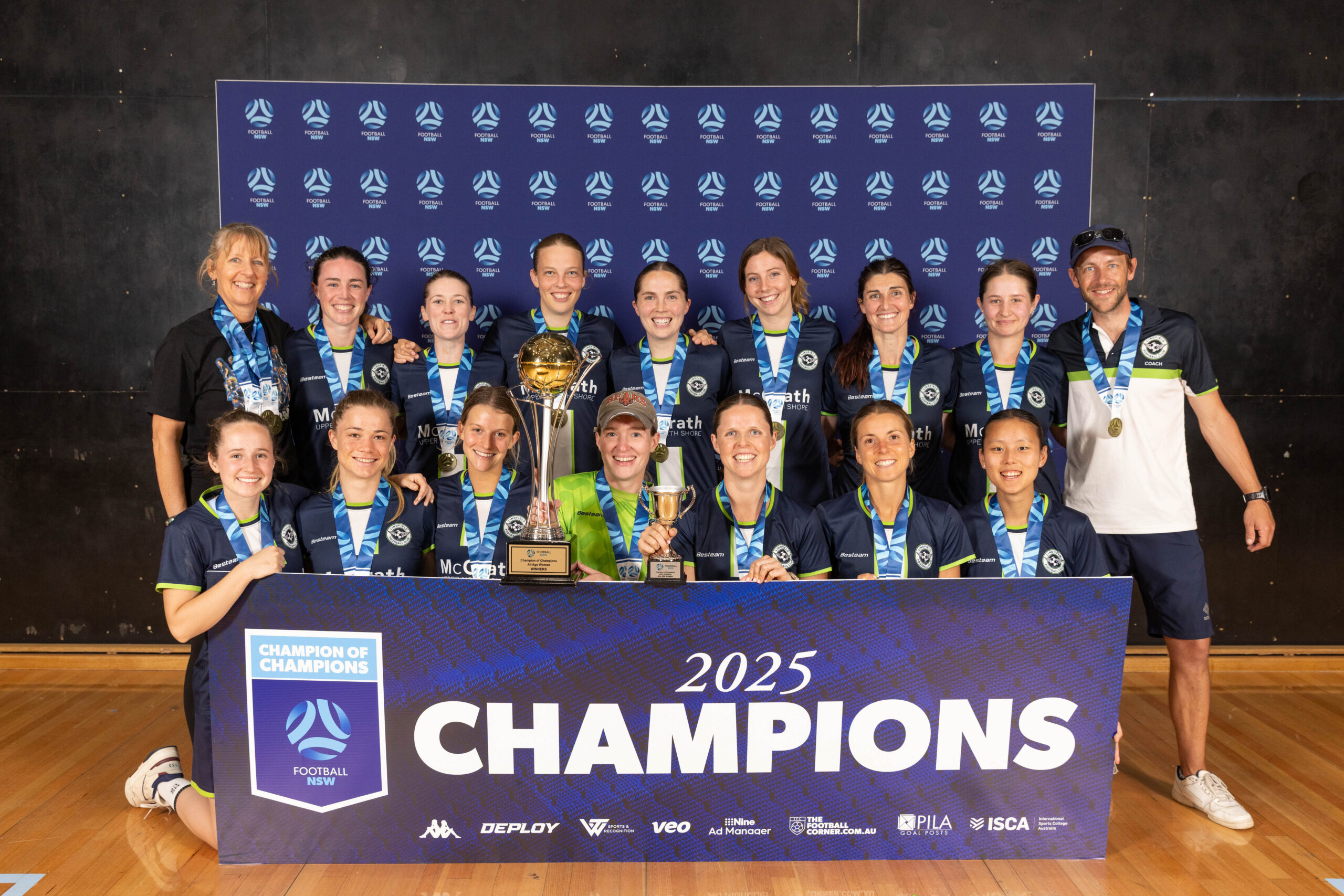 a group of people posing for the camera