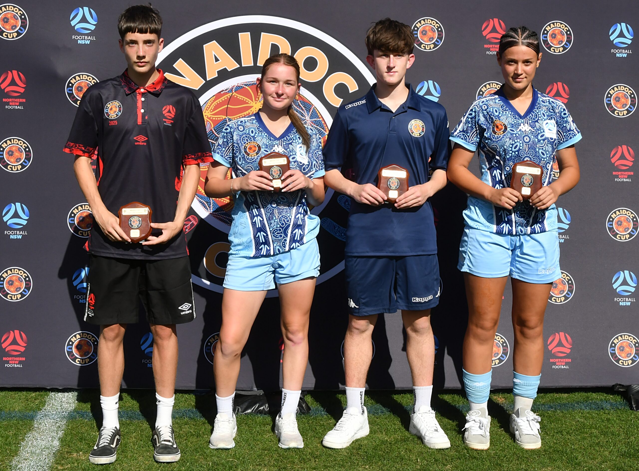 a group of people posing for the camera