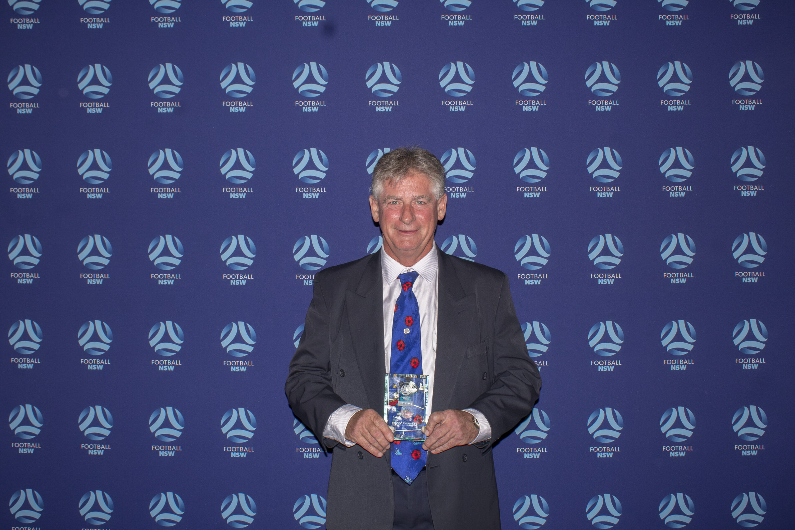 a man wearing a suit and tie