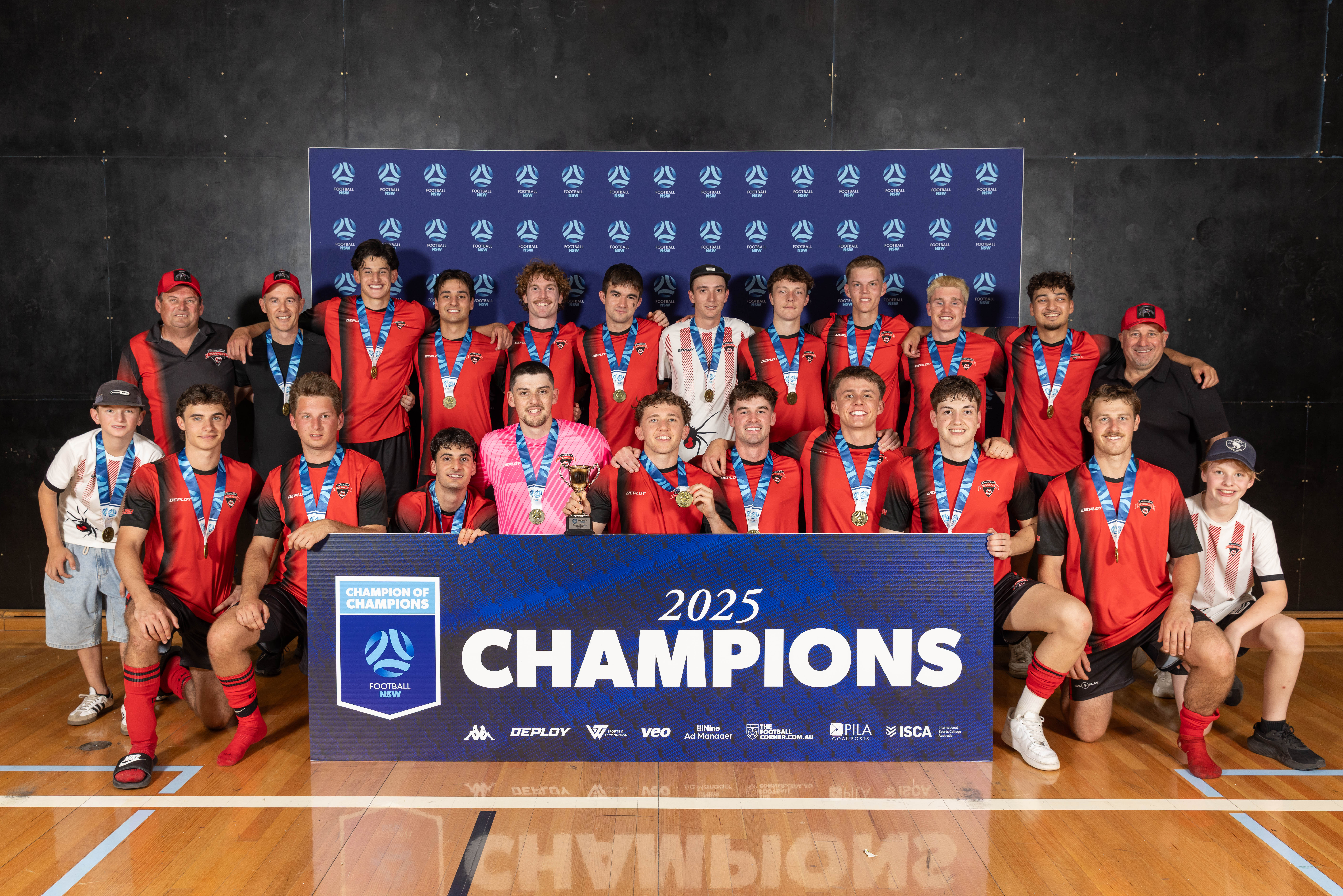 a group of people posing for the camera