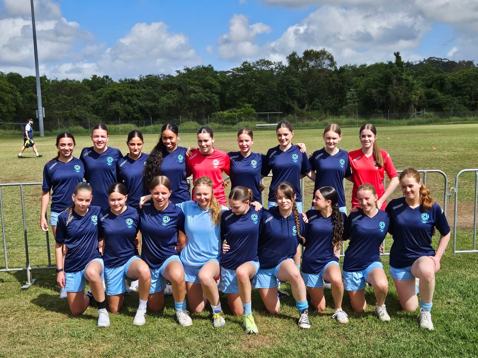 a group of people posing for a photo