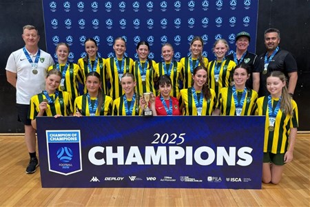 a group of people posing for a photo