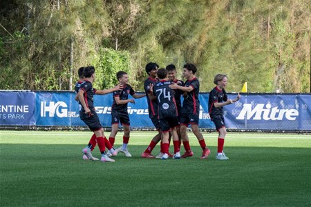 a group of football players on a field