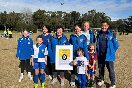 a group of people posing for a photo