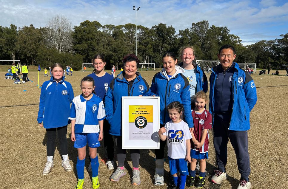 a group of people posing for a photo