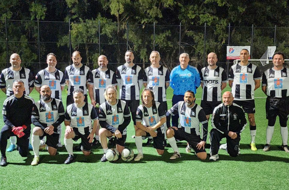 a group of people posing for a photo