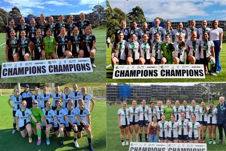 a group of people standing in front of a crowd posing for the camera